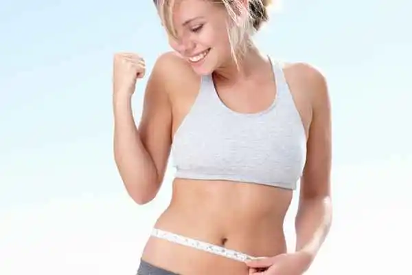 woman happy after fat reduction treatment Newark-on-Trent