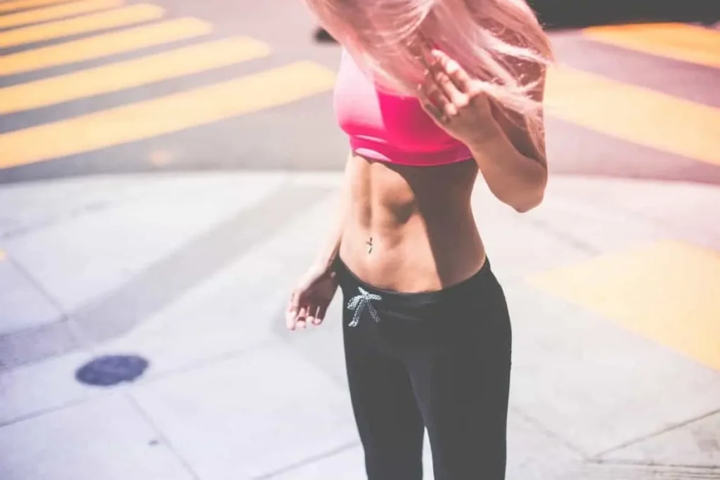 Woman with toned stomach after LA-EMS Body Sculpting Treatment Newark-on-Trent 